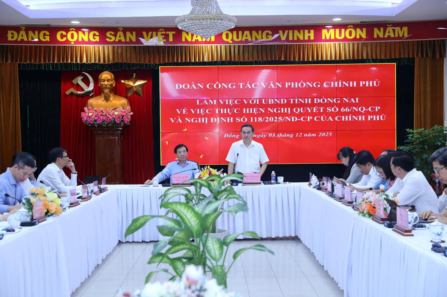 '''Description: A group of people sitting at a table

AI-generated content may be incorrect.'''